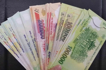 Rao bán bao lì xì in hình sổ đỏ, tiền Việt Nam bị xử lý ra sao?