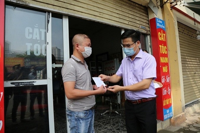 Khẩn trương hỗ trợ người lao động, người sử dụng lao động gặp khó khăn do dịch bệnh - Ảnh 1.