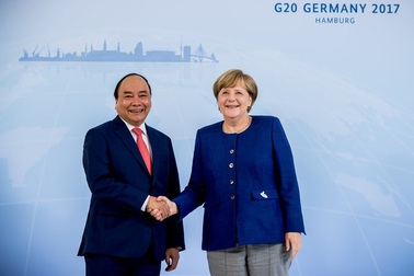 Thủ tướng Đức tiếp đón nguyên thủ thế giới đổ về Đức nhóm họp G20