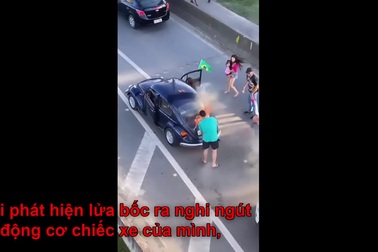 Người đàn ông xử lý bình tĩnh khi động cơ ô tô bất ngờ bốc cháy