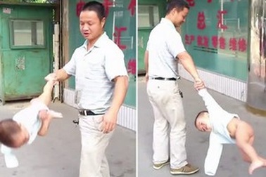 Màn tung em bé mạo hiểm của ông bố Trung Quốc