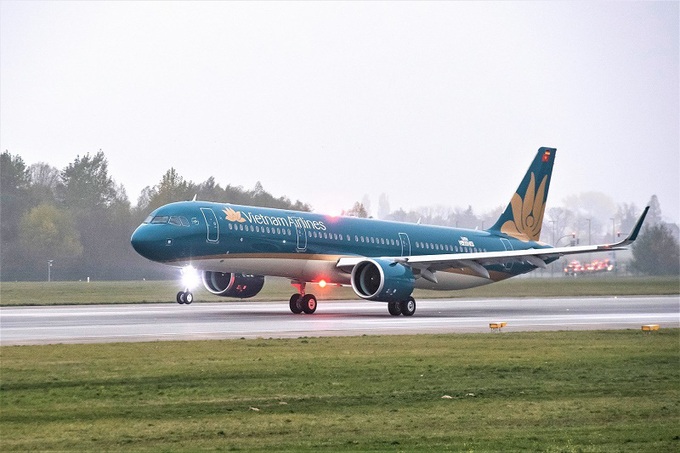 Vietnam Airlines triển khai chính sách hỗ trợ hành khách đến, đi từ Vinh, Huế, Đồng Hới - Ảnh 1.