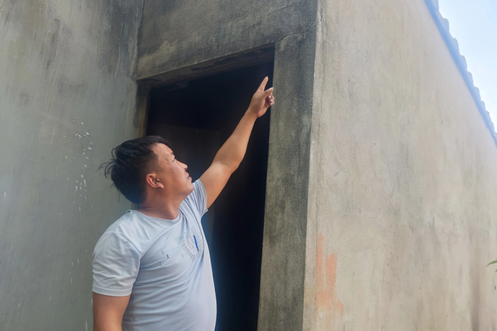 Dân ngăn cản lu đường vì nhà xuất hiện nhiều vết nứt - 1