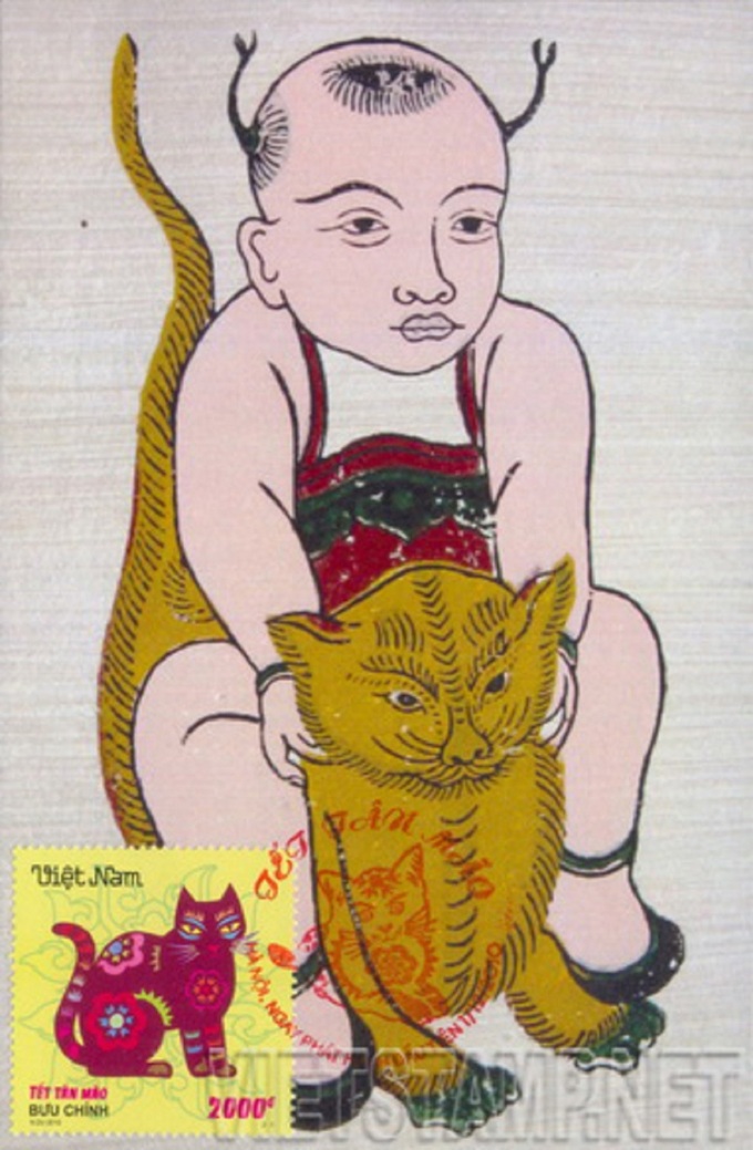 Tranh “Em bé ôm mèo” tranh dân gian Đông Hồ (Bắc Ninh).