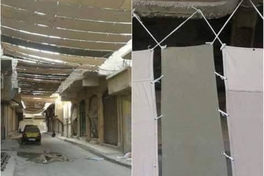 IS phủ bạt toàn thành trì Raqqa để tránh bị không kích