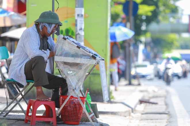 Hà Nội nắng gắt đỉnh điểm, đường phố vắng như Tết - 16 Hà Nội nắng gắt đỉnh điểm, đường phố vắng như Tết - 16