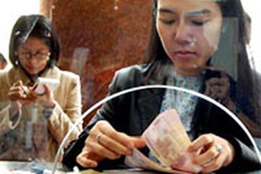 Gia nhập WTO: Đồng lương sẽ phải khác?