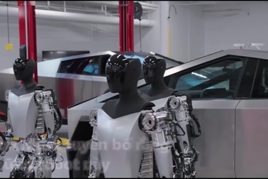 Robot hình người của hãng xe Tesla khoe kỹ năng di chuyển, cầm nắm đồ vật
