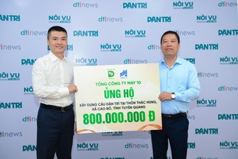 Báo Dân trí tiếp nhận 800 triệu đồng Tổng Công ty May 10 ủng hộ xây cầu