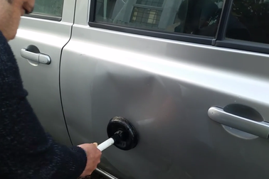 Mẹo chữa móp xe bằng...nước sôi