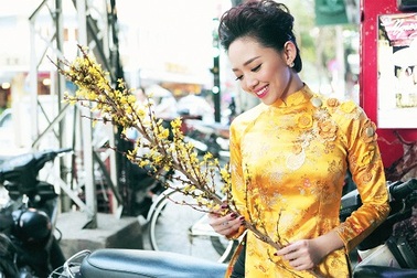 Tóc Tiên rực rỡ áo dài đón nàng xuân