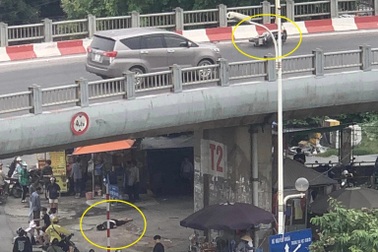 Xe máy đâm vào đường dẫn cầu Vĩnh Tuy, một người "bay" xuống đường