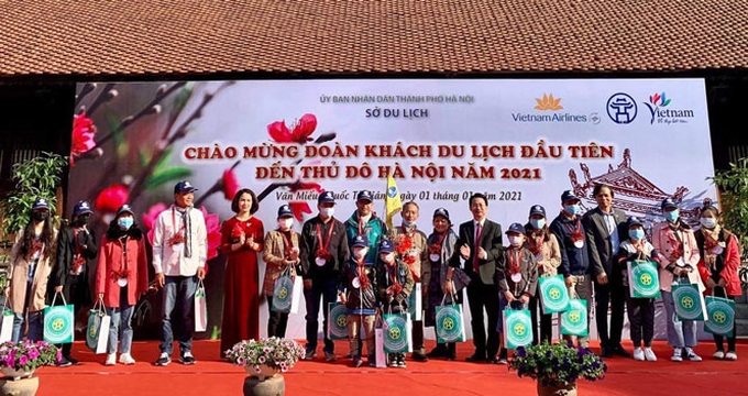Hà Nội đón đoàn khách du lịch đầu tiên năm 2021 - Ảnh 1. Hà Nội đón đoàn khách du lịch đầu tiên năm 2021 - Ảnh 1.