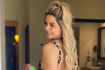 Nữ đô vật Mỹ tự tin diện đồ bơi khoe dáng gợi cảm