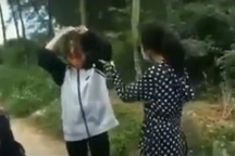 Nữ sinh dùng mũ bảo hiểm đánh bạn bị đình chỉ học 1 tuần