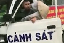 Hà Nội: Chuyển công tác cán bộ công an mặc quần soóc đi bắt hàng rong