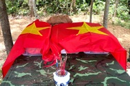 Khai mở 2 vị trí mộ, phát hiện 2 hài cốt liệt sĩ cùng mũ lưỡi trai