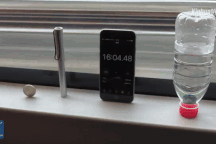 Tàu cao tốc ở Trung Quốc chạy 350km/h êm tới mức đồng xu vẫn đứng yên