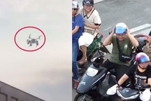 Cảnh sát dùng máy bay không người lái để nhắc người đi xe máy đội mũ bảo hiểm