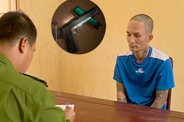 Tên trộm có 4 tiền án thủ sẵn súng ngắn theo người