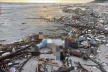 Phát hiện thi thể nam giới dạt vào bờ biển Quảng Trị