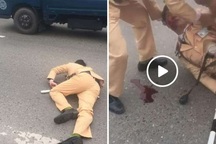 Hà Nội: Đôi nam nữ vượt đèn đỏ, tông gục cảnh sát giao thông