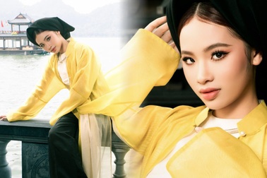 Bảo Hà diện áo dài lấy cảm hứng từ tranh Đông Hồ giữa thời tiết 15 độ C