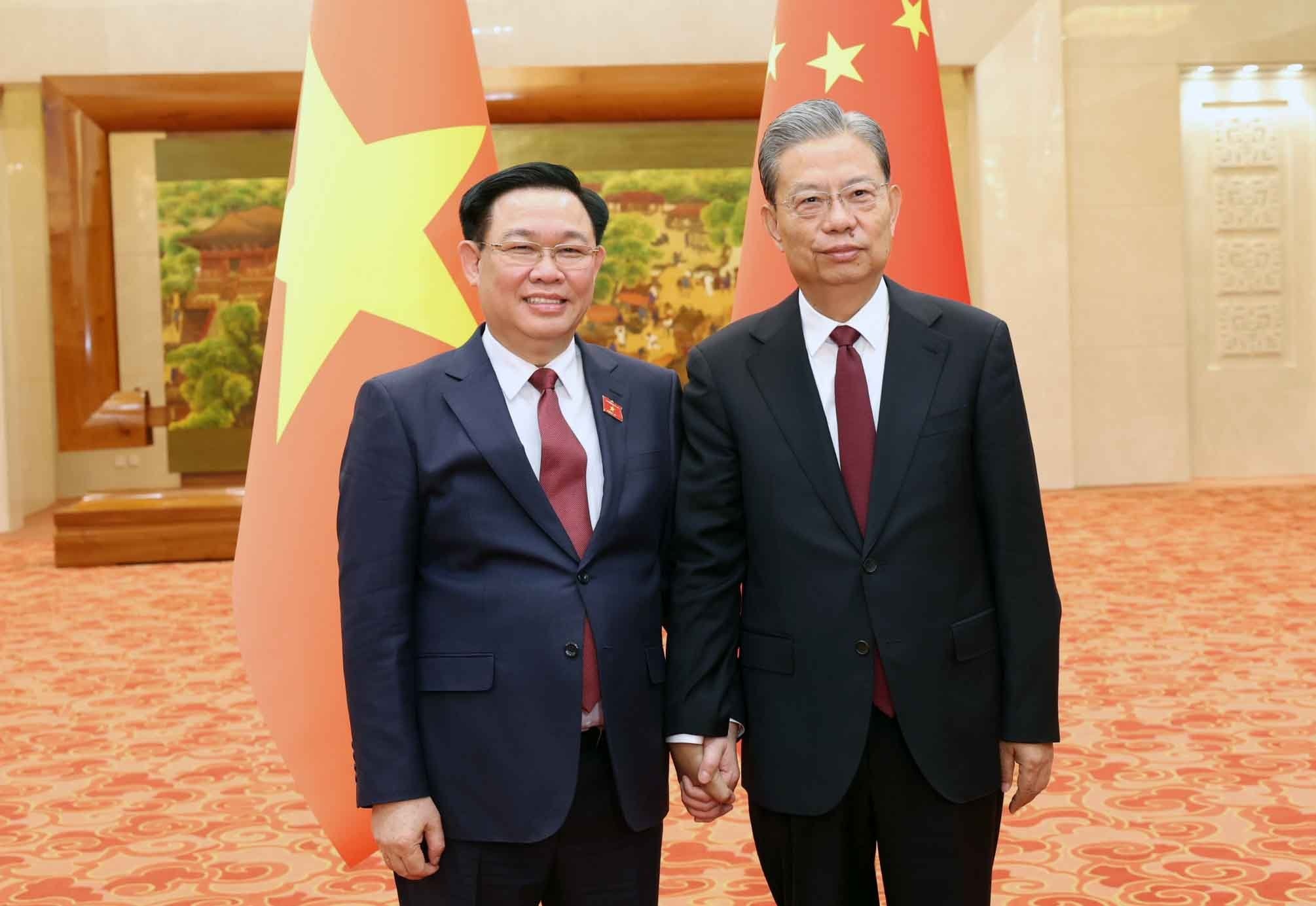 Chủ tịch Quốc hội Vương Đình Huệ hội đàm với Chủ tịch Quốc hội Trung Quốc Triệu Lạc Tế (Ảnh: TTXVN).