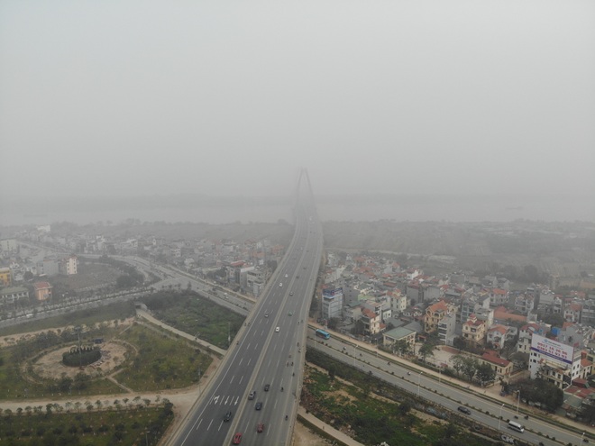 Không khí Hà Nội liên tục ở ngưỡng xấu, nhà cao tầng chìm trong mù mịt - 9 Không khí Hà Nội liên tục ở ngưỡng xấu, nhà cao tầng chìm trong mù mịt - 9
