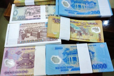 Cẩn trọng khi đổi tiền mới dịp Tết Ất Tỵ