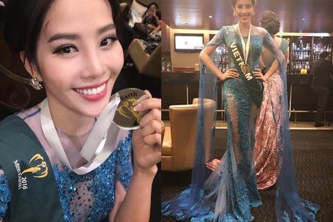 Nam Em giành huy chương Bạc trình diễn trang phục dạ hội