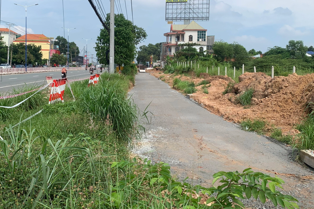 Dự án nâng cấp, mở rộng quốc lộ 13: Giải phóng mặt bằng khó khăn - 2 Dự án nâng cấp, mở rộng quốc lộ 13: Giải phóng mặt bằng khó khăn - 2