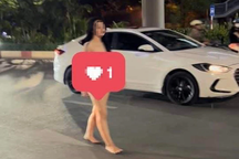 Cô gái xinh đẹp khỏa thân đi dưới lòng đường Nguyễn Trãi