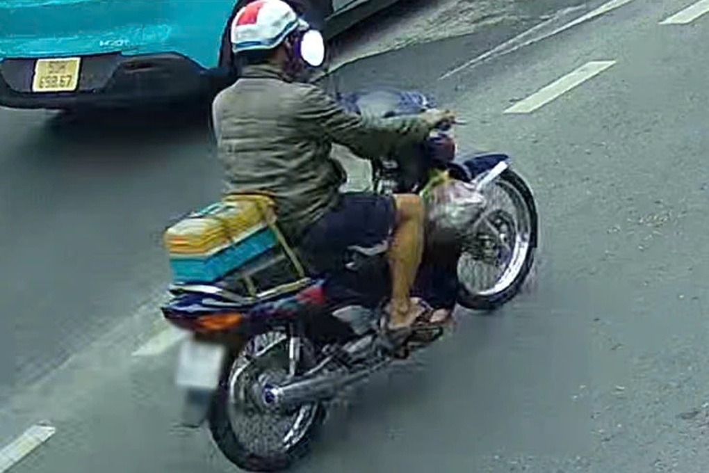 Công an tìm ra người sơn chữ bắn tốc độ trên đường ở TPHCM - 2 Công an tìm ra người sơn chữ bắn tốc độ trên đường ở TPHCM - 2