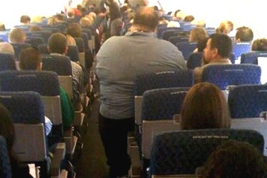 Người béo phải... trả thêm tiền khi đi máy bay