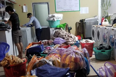 Dịch vụ giặt là 'hốt bạc" ngày Tết