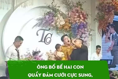 Ông bố bế hai con quẩy đám cưới cực sung, hình ảnh "hậu trường" gây bất ngờ