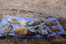 Phát hiện hài cốt liệt sỹ kèm nhiều di vật trong vườn nhà dân