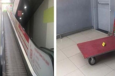 Xe đẩy trên thang cuốn trung tâm thương mại trượt xuống gây chết người