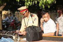 Nghiêm cấm hành vi can thiệp, tác động trong xử lý vi phạm giao thông