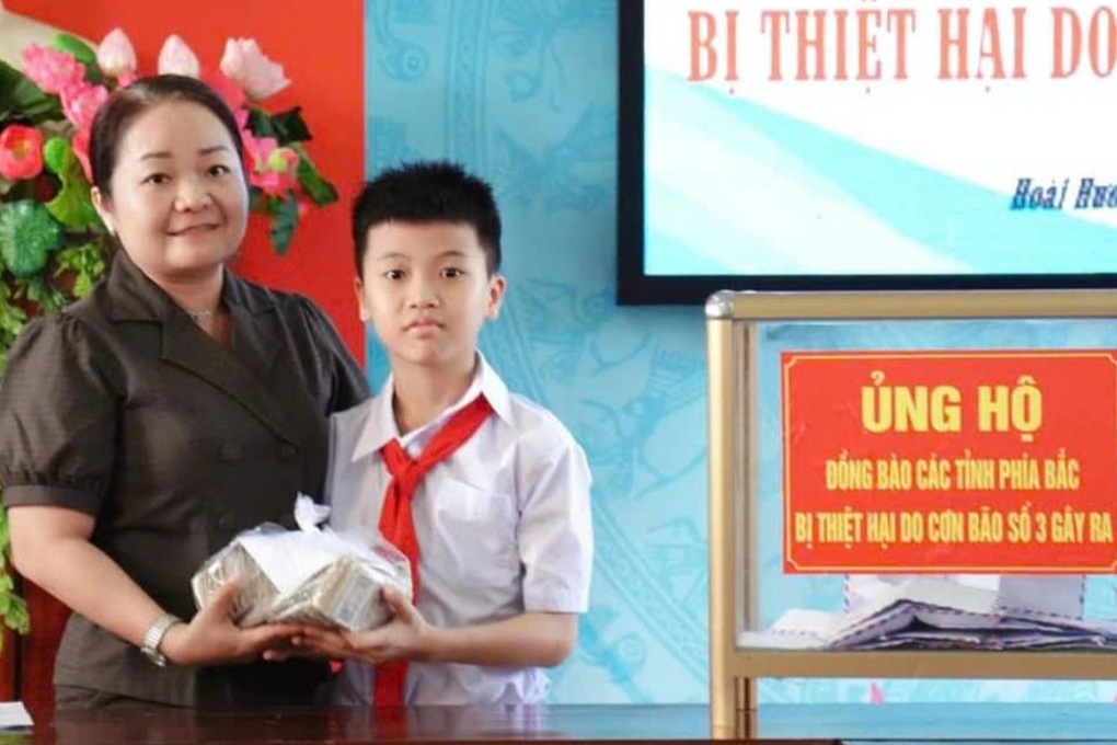 Cậu bé lớp 4 đập heo đất tiết kiệm 4 năm ủng hộ đồng bào miền Bắc - 3 Cậu bé lớp 4 đập heo đất tiết kiệm 4 năm ủng hộ đồng bào miền Bắc - 3