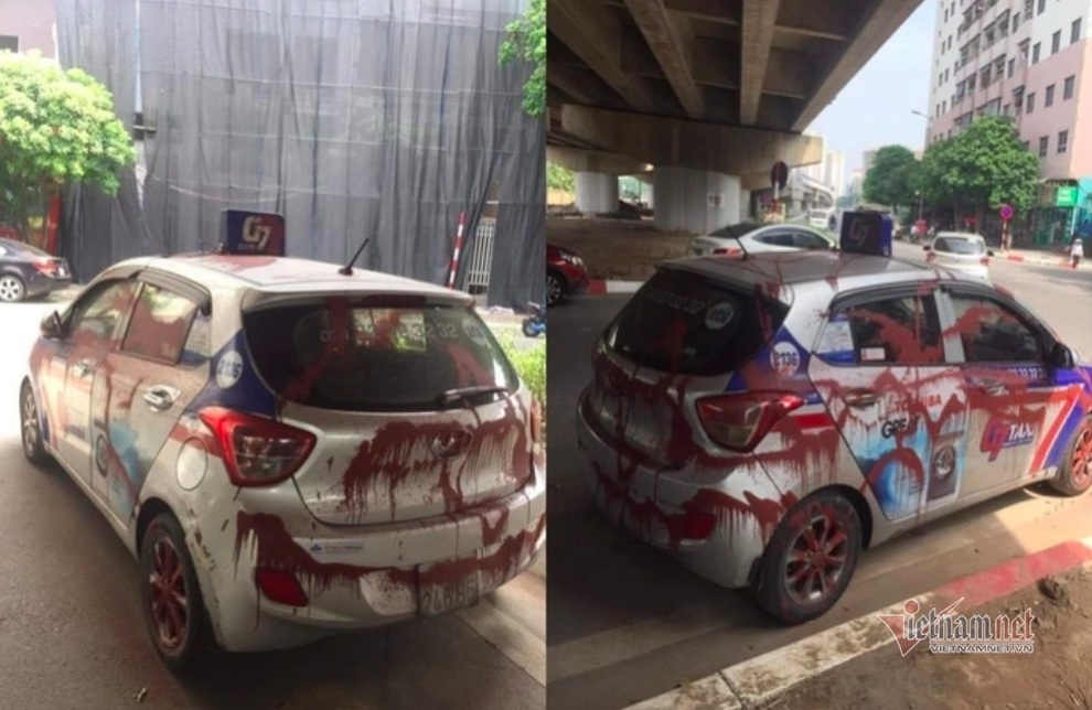 Xe taxi bị tạt kín sơn ở Linh Đàm, tài xế phẫn nộ - 1 Xe taxi bị tạt kín sơn ở Linh Đàm, tài xế phẫn nộ - 1