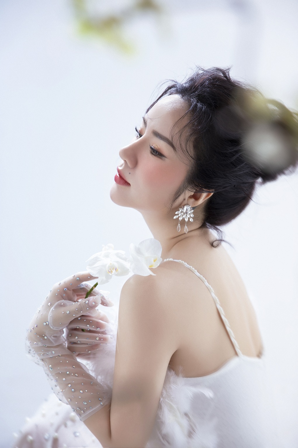 Ca sĩ Triệu Hồng Ngọc: 17 năm làm mẹ đơn thân, vóc dáng quyến rũ ở tuổi 40 - 6 Ca sĩ Triệu Hồng Ngọc: 17 năm làm mẹ đơn thân, vóc dáng quyến rũ ở tuổi 40 - 6
