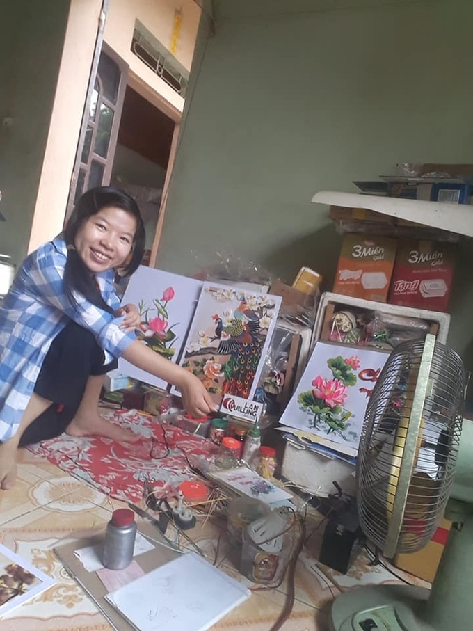 Chuyện về cô gái 29 tuổi ngồi xe lăn, cả thanh xuân gửi hồn vào những bức tranh giấy - Ảnh 1. Chuyện về cô gái 29 tuổi ngồi xe lăn, cả thanh xuân gửi hồn vào những bức tranh giấy - Ảnh 1.