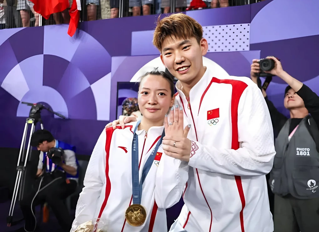 Nữ VĐV giành huy chương vàng Olympic và được cầu hôn trong cùng một ngày - 7 Nữ VĐV giành huy chương vàng Olympic và được cầu hôn trong cùng một ngày - 7