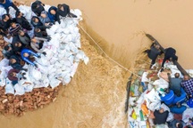 Trung Quốc: Mưa lũ phá hủy hàng nghìn ngôi nhà, nhiều đập bị vỡ