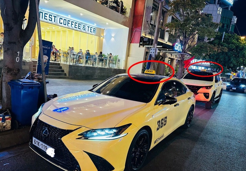 Hàng loạt xe sang Bentley, BMW gắn mào taxi diễu phố - 1 Hàng loạt xe sang Bentley, BMW gắn mào taxi diễu phố - 1