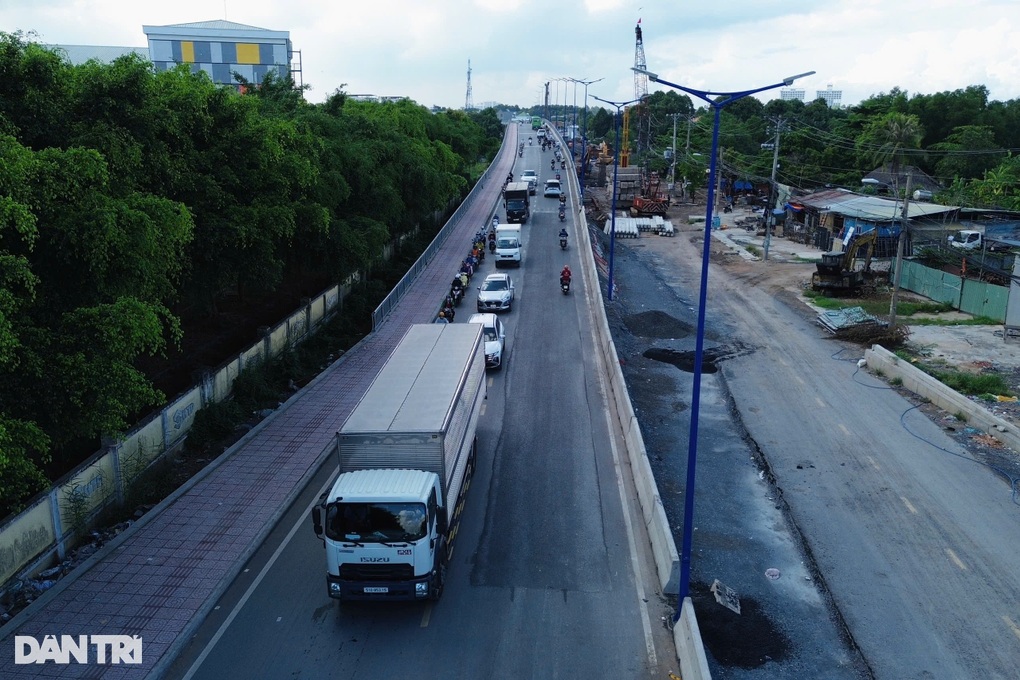 Khắc phục xong sự cố sụt lún đường dẫn cầu Tăng Long ở TPHCM - 2 Khắc phục xong sự cố sụt lún đường dẫn cầu Tăng Long ở TPHCM - 2
