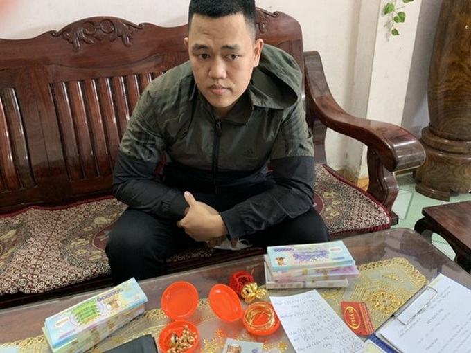 Đối tượng Nguyễn Văn Cảnh cùng tang vật. (Ảnh: Báo Sài Gòn Giải Phóng).