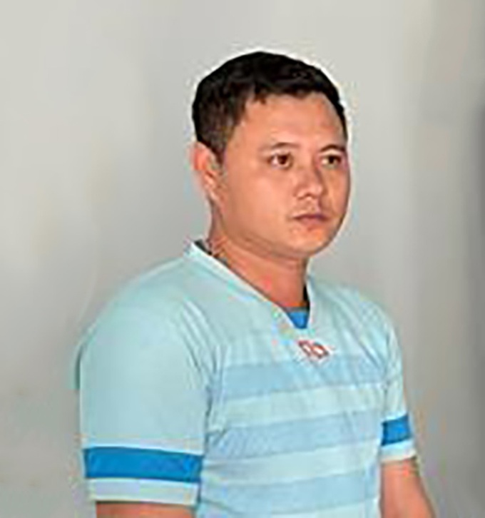 Nguyễn Thành Trung tại cơ quan công an